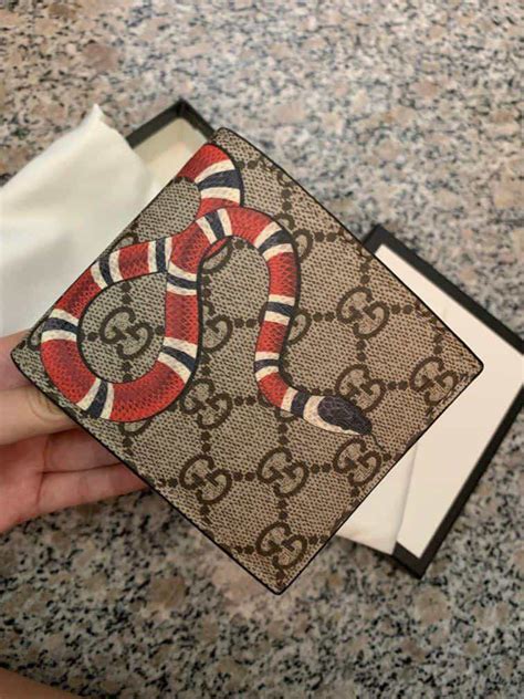 gucci wallet snake real vs fake|Gucci men's wallet knockoff.